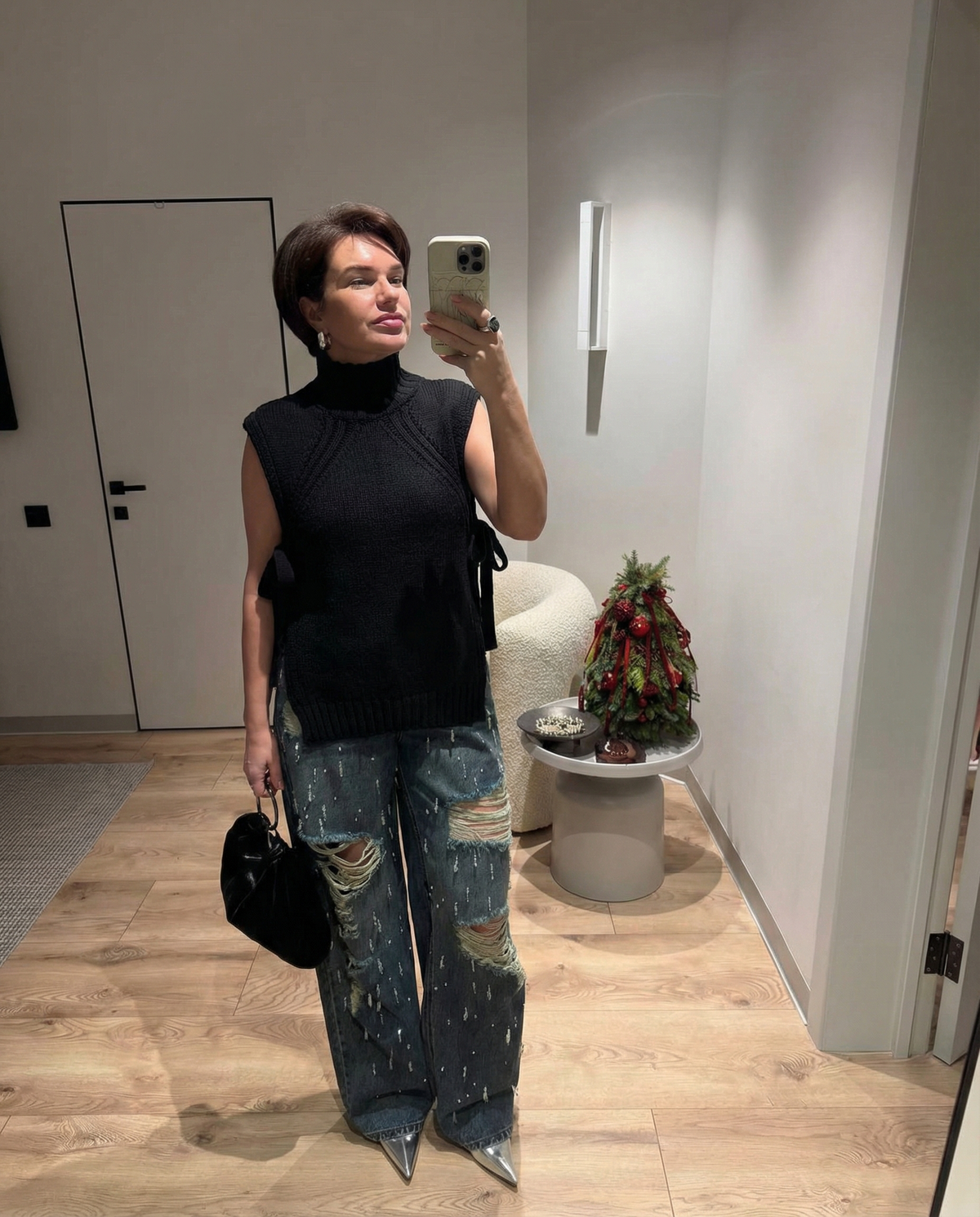 Vera | Sleeveless Knit Sweater Black Tie Side High Neck
